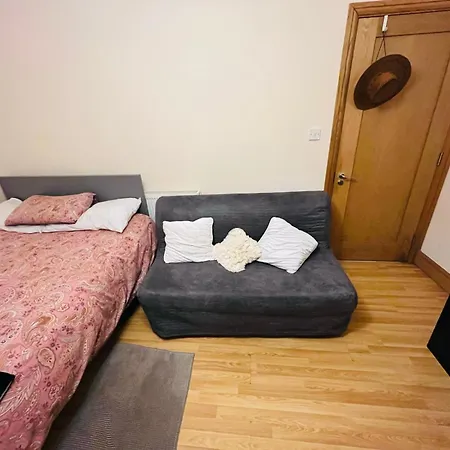Habitación Cuádruple Habitación en casa particular